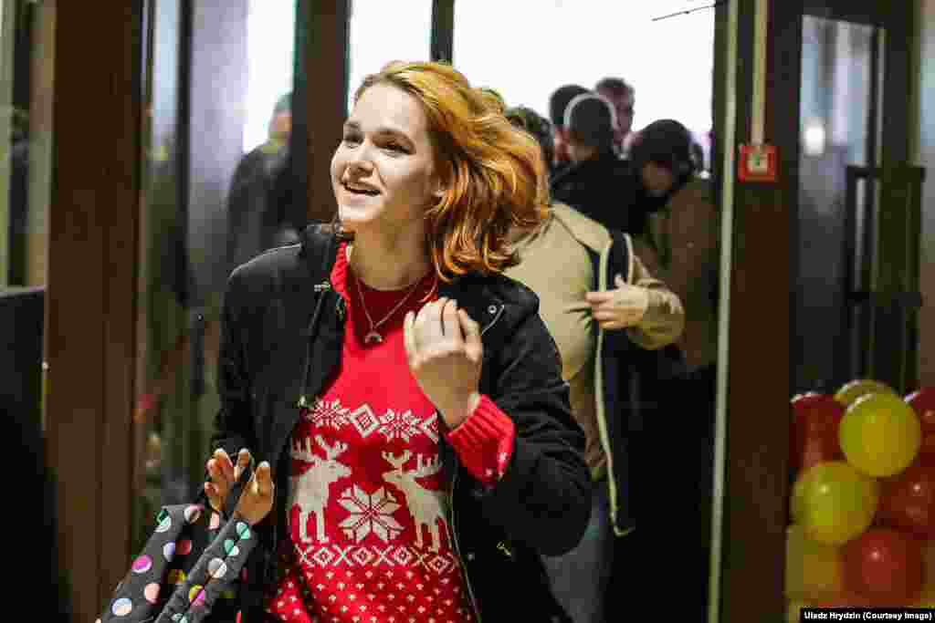 This young woman looks happy to have made it through the crush, but Belarus may be worried about the popularity of fast food outlets like this one. Obesity rates among females in the country are the highest in Europe. 