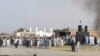 د شمالي وزیرستان په میرعلي ښارګوټي کې راټول احتجاجیان د هدفي وژنو ضد راوتلي. ۱۵م می ۲۰۱۸ 