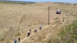 KAZAKHSTAN -- Rresidents of the town of Arys are evacuated after an explosion at a local ammunition depot, in the Turkistan region, June 24, 2019