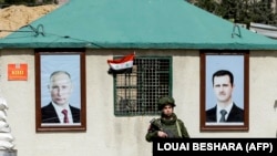 Портрети президента Росії Володимира Путіна (ліворуч) та його сирійського колеги Башара Асада в Сирії, 1 березня 2018 року