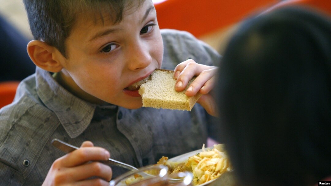 A child has a meal at an orphanage in the southern Russian city of Rostov-na-Donu.