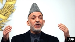 Critics fear Karzai wants to retain control over Afghan media