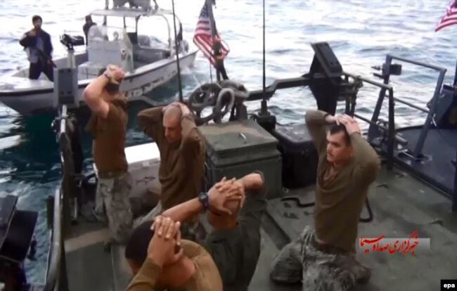 U.S. military personnel are shown on their boat after they were captured by IRGC forces in the Persian Gulf in January 2016.