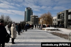 People wait in line to enter the court on February 17.
