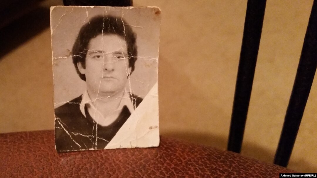 A creased and faded photograph of Visit is all that remains.