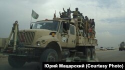 Vehicul militar șiit în apropiere de Mosul, nordul Irakului