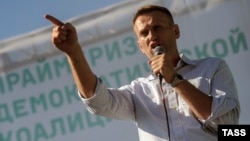 Russian opposition leader Aleksei Navalny speaks during a meeting with locals in Novosibirsk on June 7.