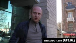 Armenia - Government loyalist Davit Simonian is pictured outside a court house in Yerevan, 19Feb2016.