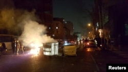 A photo obtained by Reuters from social media showing people protesting on the streets of Tehran on December 30.
