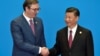Serbian President Aleksandar Vucic (left) has sought to build a warm relationship with Chinese President Xi Jinping (file photo)