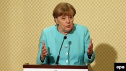 Angela Merkel, speaking on March 3 in Tunisia, said public gatherings were approved or rejected at a local level in Germany.