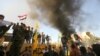Forțele de securitate irakiene au folosit gaze lacrimogene pentru a dispersa protestatarii din prejma ambasadei SUA din Bagdad 