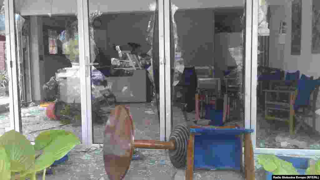 A business was damaged by rioters who attacked the property of ethnic Albanians in the neighborhood.