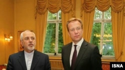 Iranian Foreign Minister Mohammad Javad Zarif meet with Norwegian counterpart Borge Brende on June 12.
