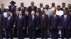 Russian President Vladimir Putin waves to the camera as he poses with African leaders at the Russia-Africa Summit in Sochi in October 2019. 