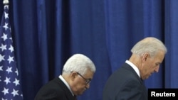 Palestinian President Mahmud Abbas (left) and U.S. Vice President Joe Biden after their joint news conference in the West Bank city of Ramallah