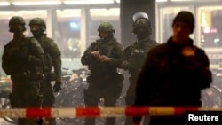 German police secure the main train station in Munich on January 1.