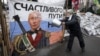 Портрет Владимира Путина на одной из баррикад Евромайдана, 9 января 2014 года