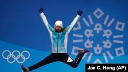 Юлия Галышева на пьедестале зимней Олимпиады в Южной Корее, где она взяла бронзу, февраль 2018 года. 