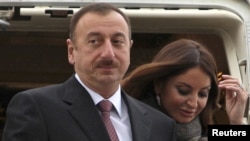Portugal -- Azerbaijan President Ilham Aliyev arrives with his wife Mehriban to attend the NATO Summit in Lisbon, 19Nov2010