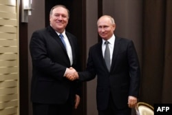 Владимир Путин и Майк Помпео в Сочи 14 мая 2019 года