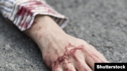 Turkmenistan. Young killed man lying on the street, generic, Shutterstock.
