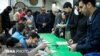 Voter in Iran's parliamentary elections on Friday wearing a mask for protection against coronavirus infection. February 21, 2020