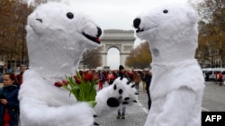 Activists dressed as polar bears take part in an environmentalist demonstration, which was held on the sidelines of a major climate change conference in Paris on December 12.