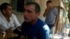 Azerbaijan - A screenshot of an amateur video of Armenian citizen Karen Petrosian talking to residents of Aqbulaq village.