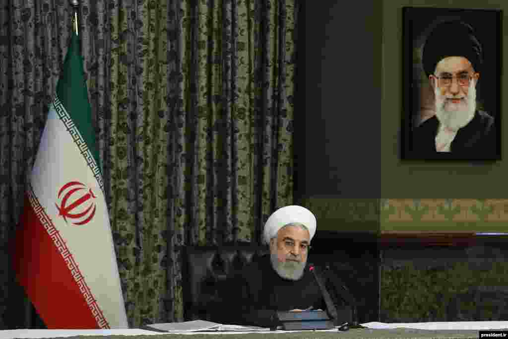 Iranian President Hassan Rouhani sitting alone in his cabinet meeting which was held in a different room on Wednesday, March 03, 2020, after reports of infection of some cabinet member with Coronavirus.
