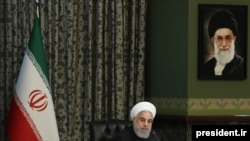 Iranian President Hassan Rouhani sitting alone in his cabinet meeting which was held in a different room on Wednesday, March 03, 2020, after reports of infection of some cabinet member with Coronavirus.