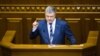 Порошенко підписав закони про розмитнення авто на «єврономерах»