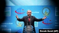 Turkish President Recep Tayyip Erdogan speaks as he inaugurates a gleaming new aviation hub in Istanbul, October 29, 2018