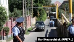 Kazakhstan - The fighting/shooting between police and group of people /Kazakh police/. Almaty region, Karasai district, 17Aug2012.