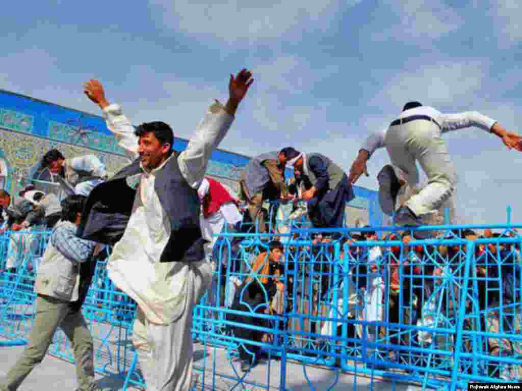 Norouz celebration in Afghanistan - Norouz Day in Mazar-e Sharif. People usually make pilgrimage to Mazar Al-Sharif to celebrate New day in the town's shrine. 