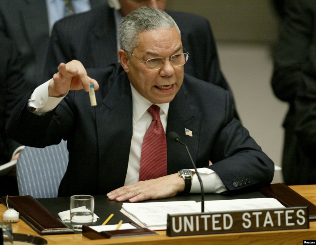 In the run-up to the invasion, the administration of U.S. President George W. Bush argued that Iraq was concealing weapons of mass destruction. Here, Secretary of State Colin Powell holds up a vial that he described as one that could contain anthrax during a presentation on Iraq to the UN Security Council on February 5, 2003.