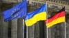 Флаги ЕС, Украины и Германии у здания Рейхстага