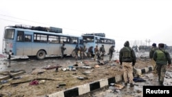 The wreckage of a bus after an attack that killed more than 40 Indian soldiers on February 14.