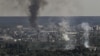  UKRAINE – Smoke and dirt rise from the city of Severodonetsk during fighting between Ukrainian and Russian troops at the eastern Ukrainian region of Donbas on June 14, 2022