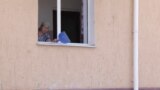 GRAB - Residents Return To Kazakh City After Ammo Blast