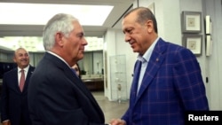 د ترکي ولسمشر رجب طيب اردوغان او ریکس ټيلرسن