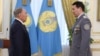Нурсултан Назарбаев в бытность президентом Казахстана вручает государственную награду Самату Абишу, тогда заместителю председателя КНБ. Астана, май 2014 года