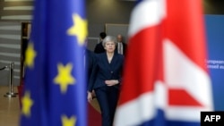 Theresa May a negociat cu liderii europeni o nouă dată pentru intrarea în vigoare a plecării din UE