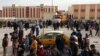 Diplaced Iraqis seeking refuge gather in a residential area on the outskirts of the city of Ramadi after fleeing ongoing battles between the Iraqi Army and antigovernment fighters in Anbar Province. 