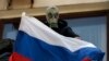 Russian City Warns Environmental Activists Not To Greet Putin In Gas Masks