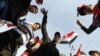 Deadly Clashes In Baghdad Between Police, Sadr Supporters