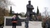 Russian President Vladimir Putin (left) delivers a speech during the unveiling ceremony of a monument to Tsar Aleksandr III in Yalta, Crimea, on November 18.