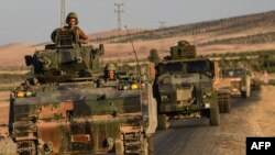 Syria -- Turkish soldiers drive back to Turkey from the Syrian-Turkish border town of Jarabulus, September 02, 2016
