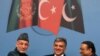 Turkish President Abdullah Gul (centre) with his Pakistani and Afghan counterparts Asif Ali Zardari (right) and Hamid Karzai (left) in Istanbul