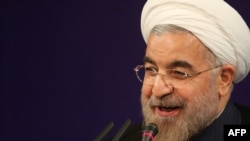 Президент Ирана Хасан Роухани в ходе первой пресс-конференции на посту главы государства. Тегеран, 6 августа 2013 года. 